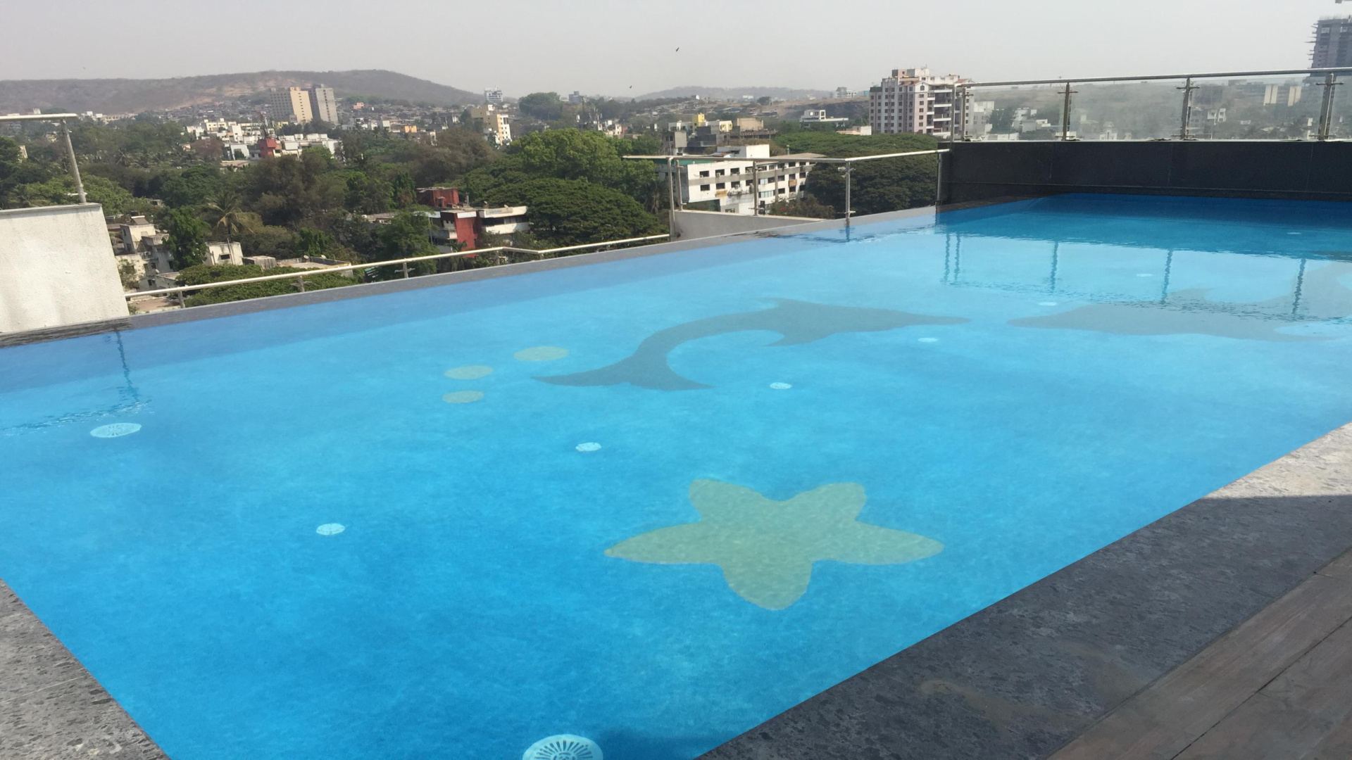 Rooftop pool with starfish mosaic